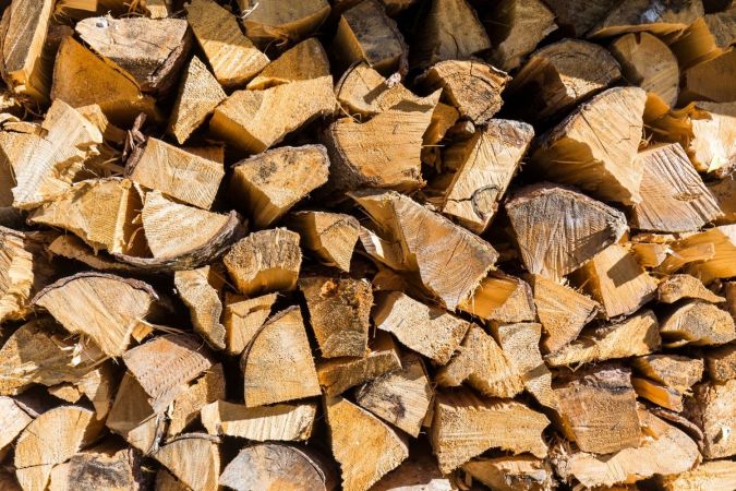 This Cheap Storage Hack Keeps My Firewood Dry All Winter Long