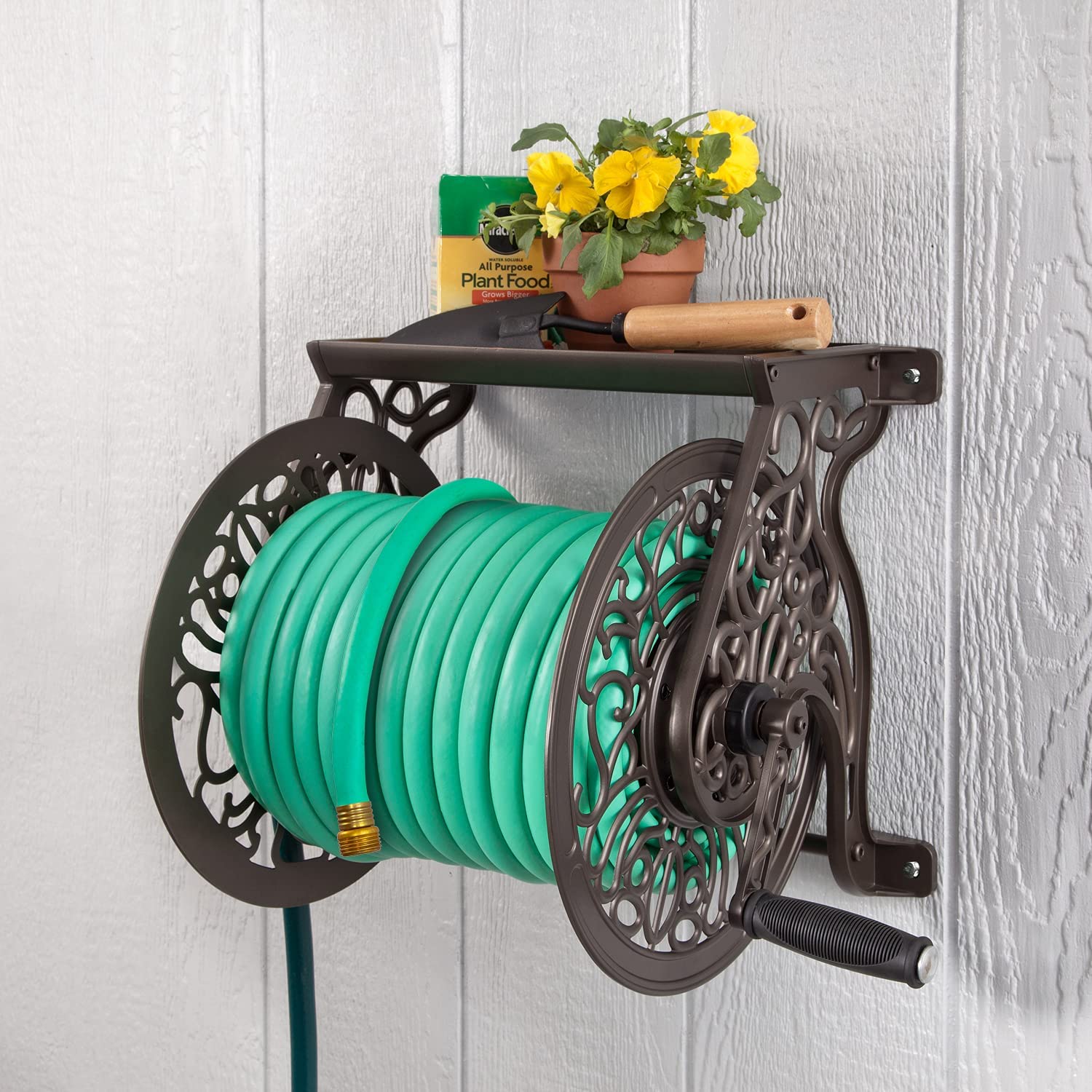 How to Mount a Garden Hose Reel to Your House