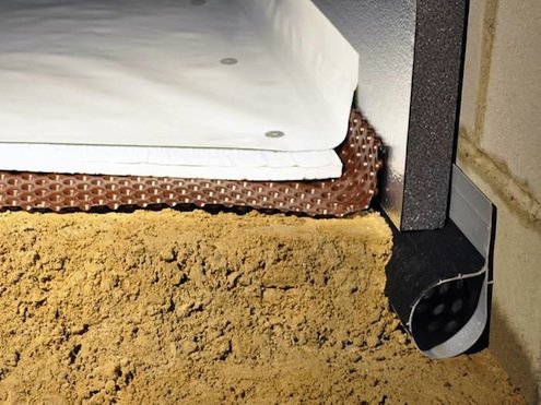 Crawl space insulation, varpor barrier and water drainage system