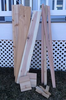Cedar boards, cut to size, for DIY planter