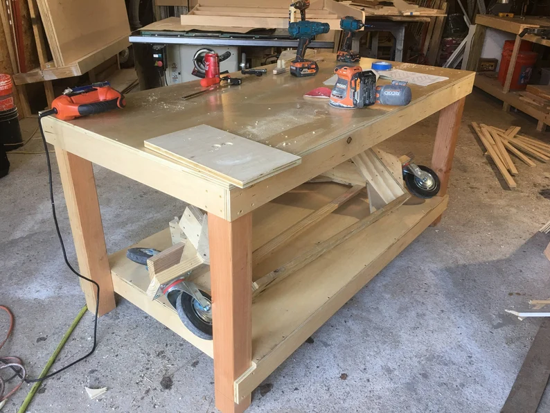 Used workbench in a home garage workshop.