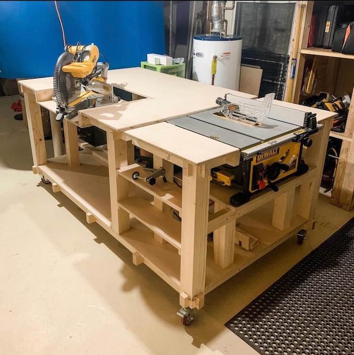 wood workbench with table saw