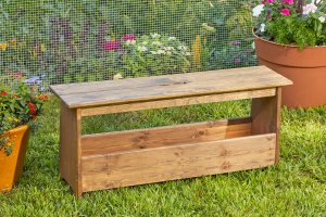 A freshly stained and sealed wooden shelf.