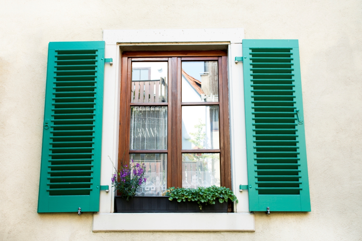 When Remodeling an Old House, What Should You Keep - retro green shutters