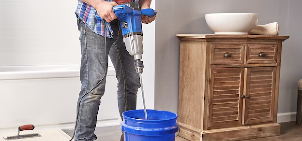 A made uses a Kobalt mud mixer.