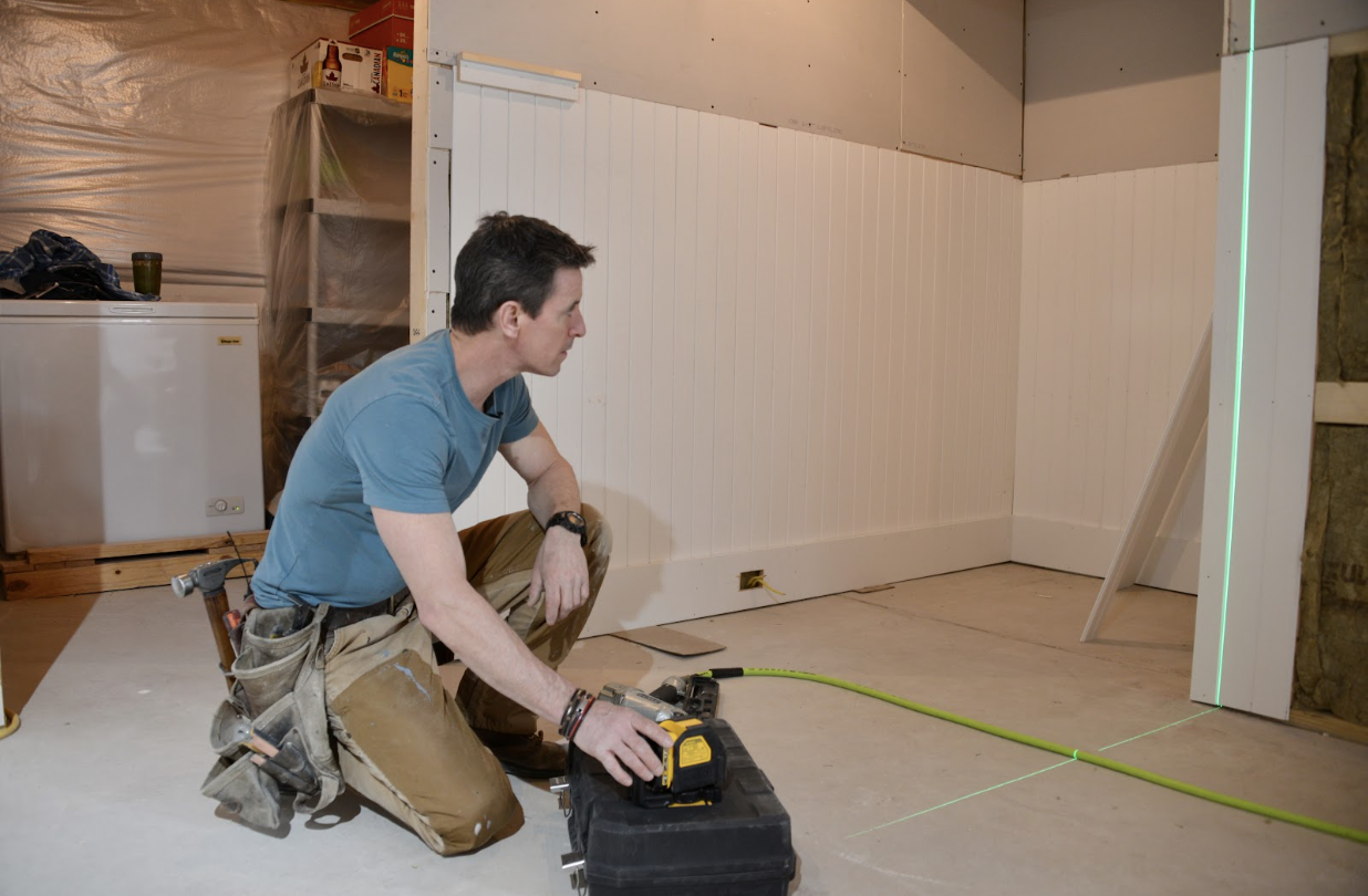 Using a spirit level works, but a laser level makes it easier to lay out and level the beadboard.