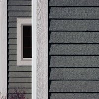 What’s the Difference? Vinyl vs. Engineered Wood Siding on Sheds