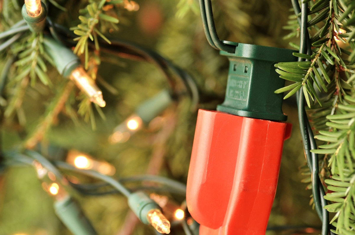 Christmas lights plugged into splitter.