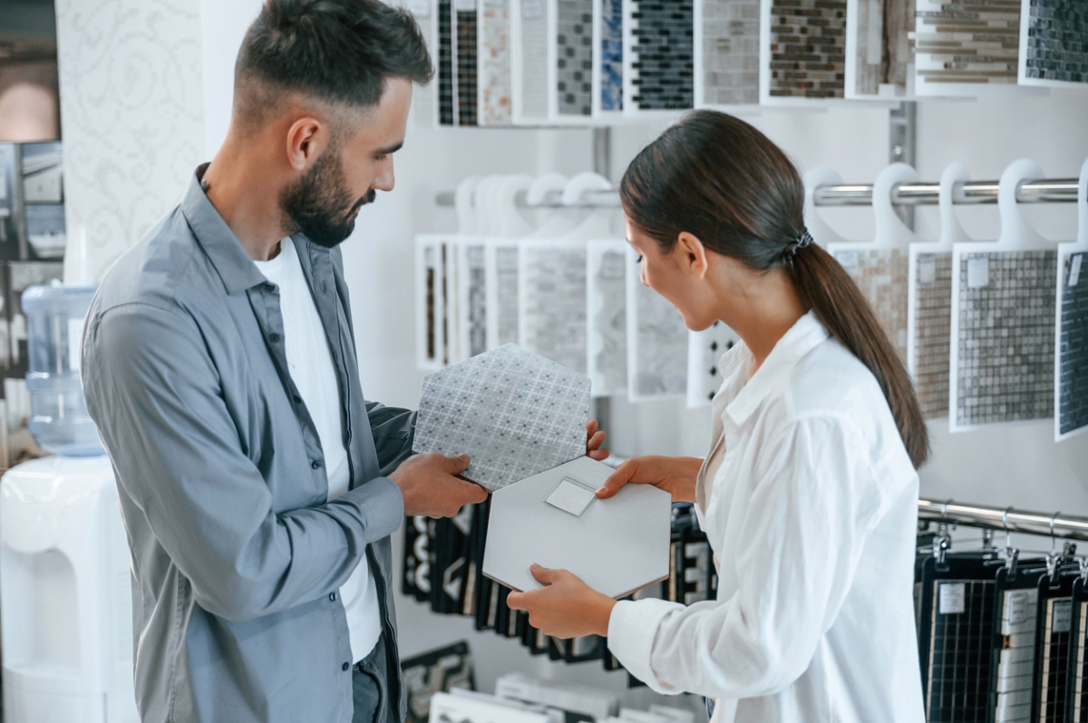 how to tile a bathroom wall - couple shopping for ceramic tiles