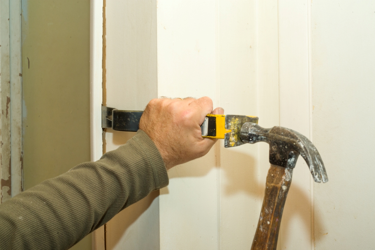 How to Install a Prehung Door - prying door