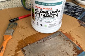 CLR rust remover and a piece of metal upon which the metal has been applied.