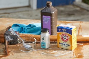 Materials needed for making rust remover: baking soda, cream of tartar, hydrogen peroxide, rusty axe.