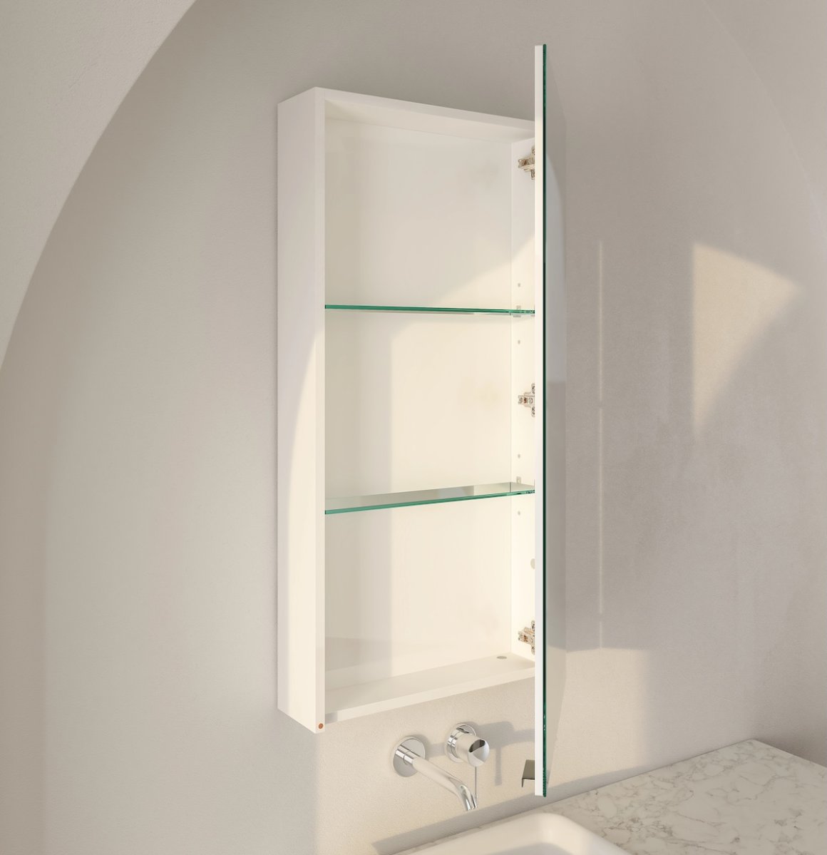 White medicine cabinet ajar on a wall revealing emtpy shelves.