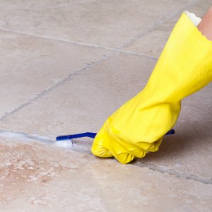 How to Seal Grout - Clean Grout with a Toothbrush