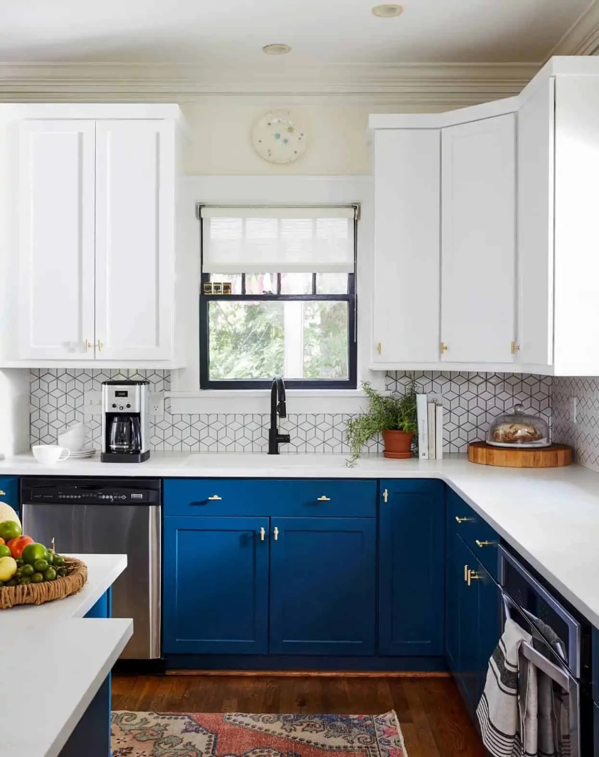Two toned cabinet kitchen with white cabinets on top and royal blue on bottom