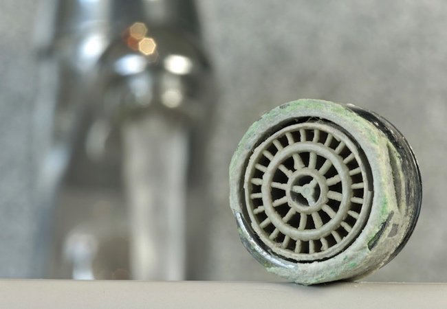 How to Install a Water Softener - Mineral Deposit on Faucet Aerator