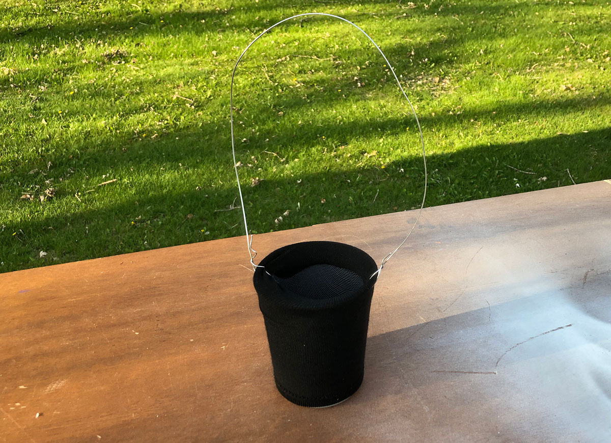 A DIY mosquito trap using sock and stagnant water.