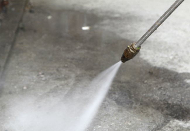 Concrete Floor Repair - Cleaning with a Pressure Washer