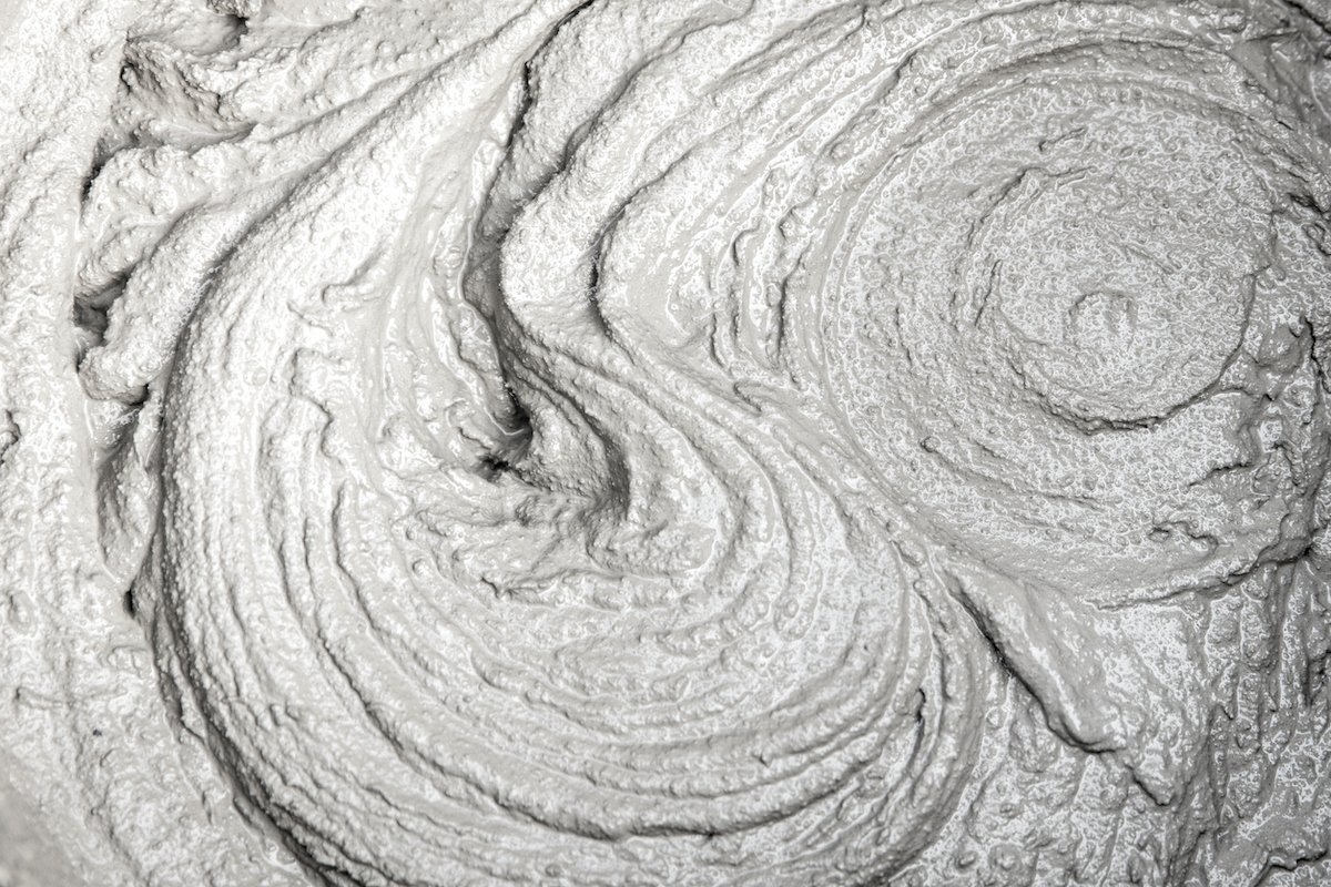 Close-up view of mixed grey grout.