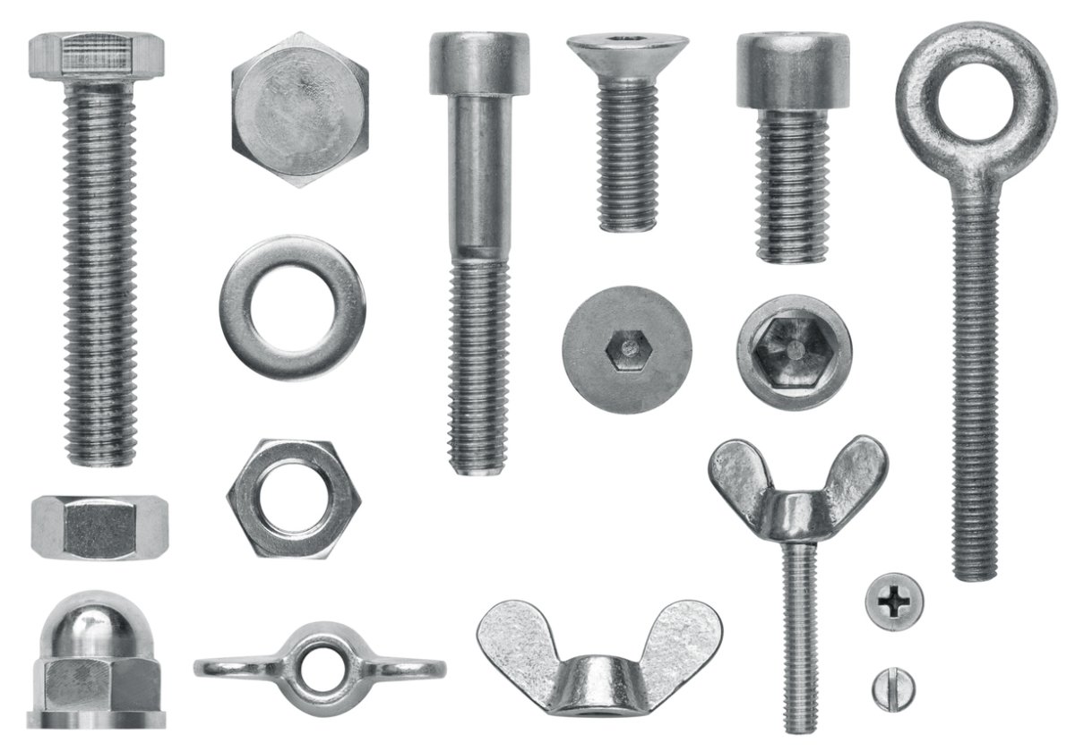 An assortment of screws and bolts on a white background.