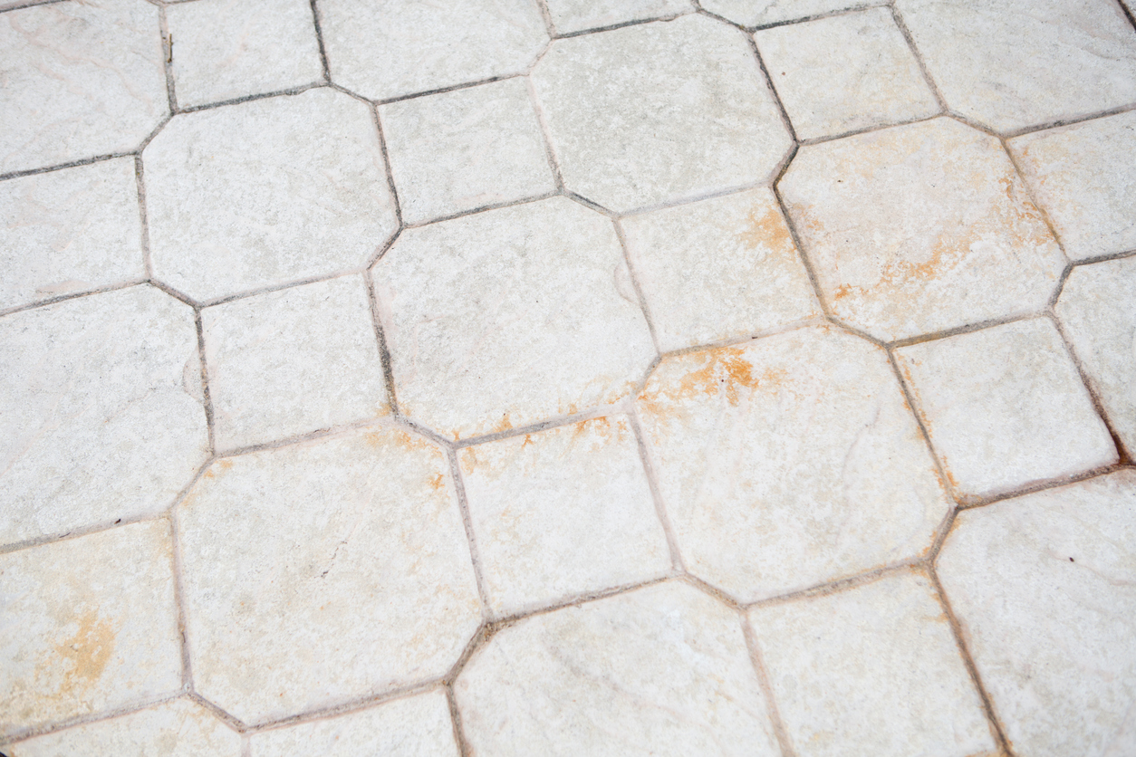 Color image of the stone driveway of a home in Florida that needs a power washing.