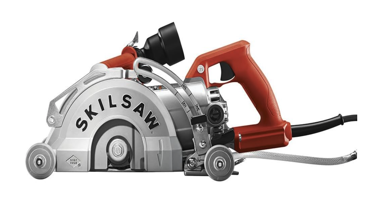 A Skilsaw concrete saw with red detailing. 