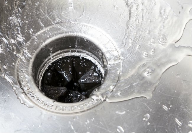 How to Fix a Leaking Garbage Disposal Yourself