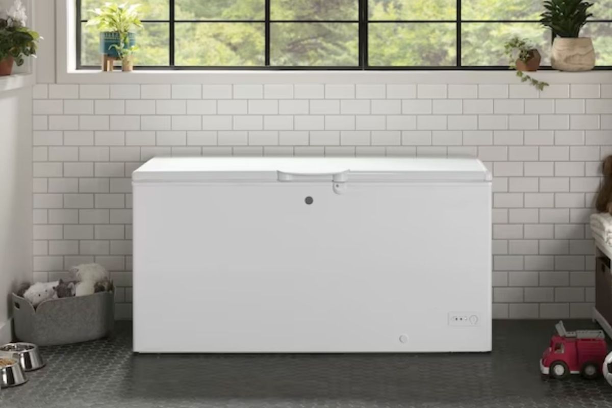 The best chest freezer in a room with tiled walls and cement floors.