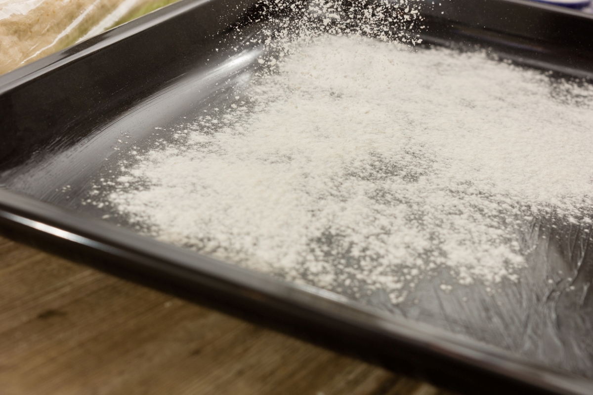 how to clean cookie sheets - white powder sprinkled on baking sheet