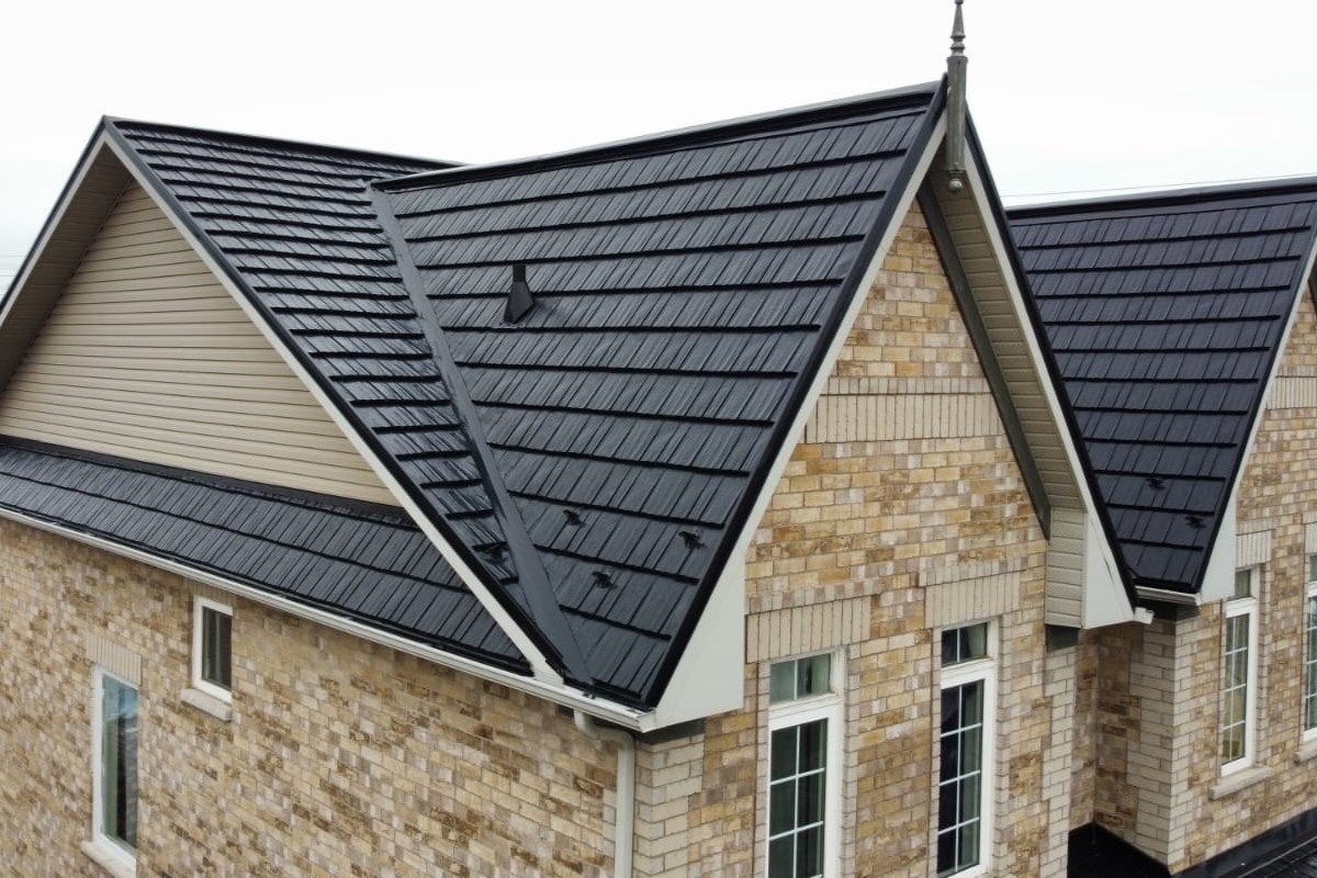 Roof with rustic aluminum shingles.