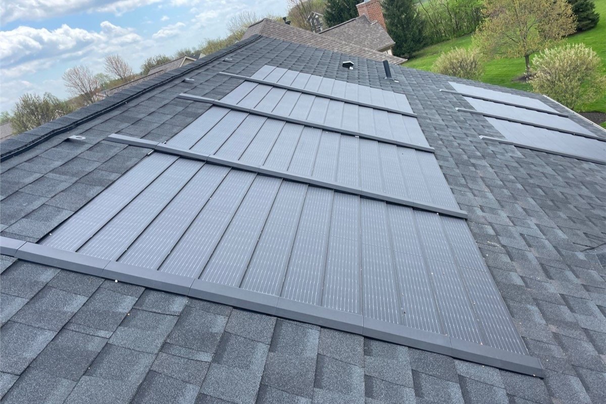 Solar shingles on the roof.
