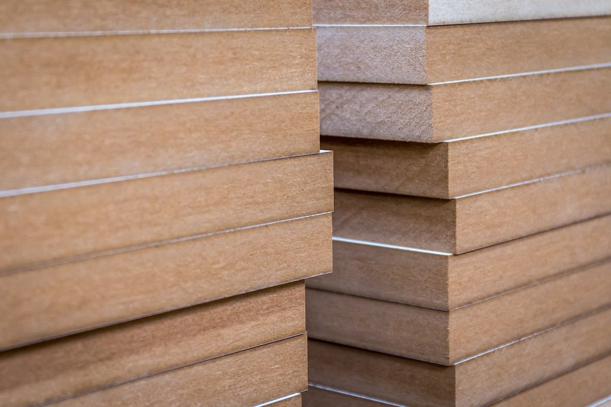 Side view of stacks of laminated MDF boards.