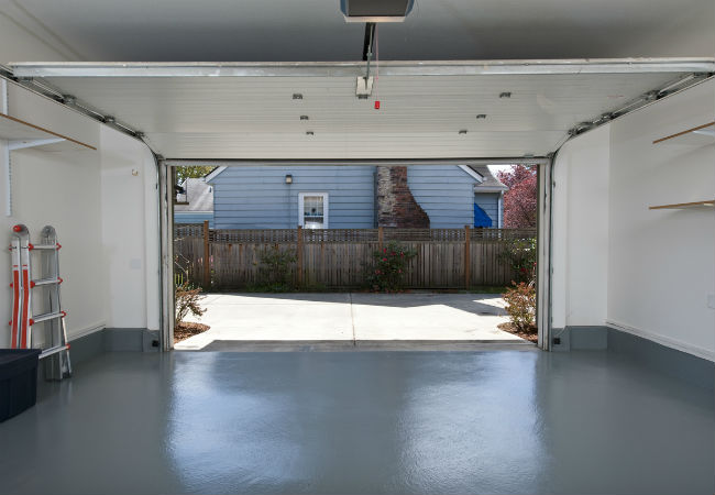 A wide shot of a garage that's been painted with the best garage floor paint option