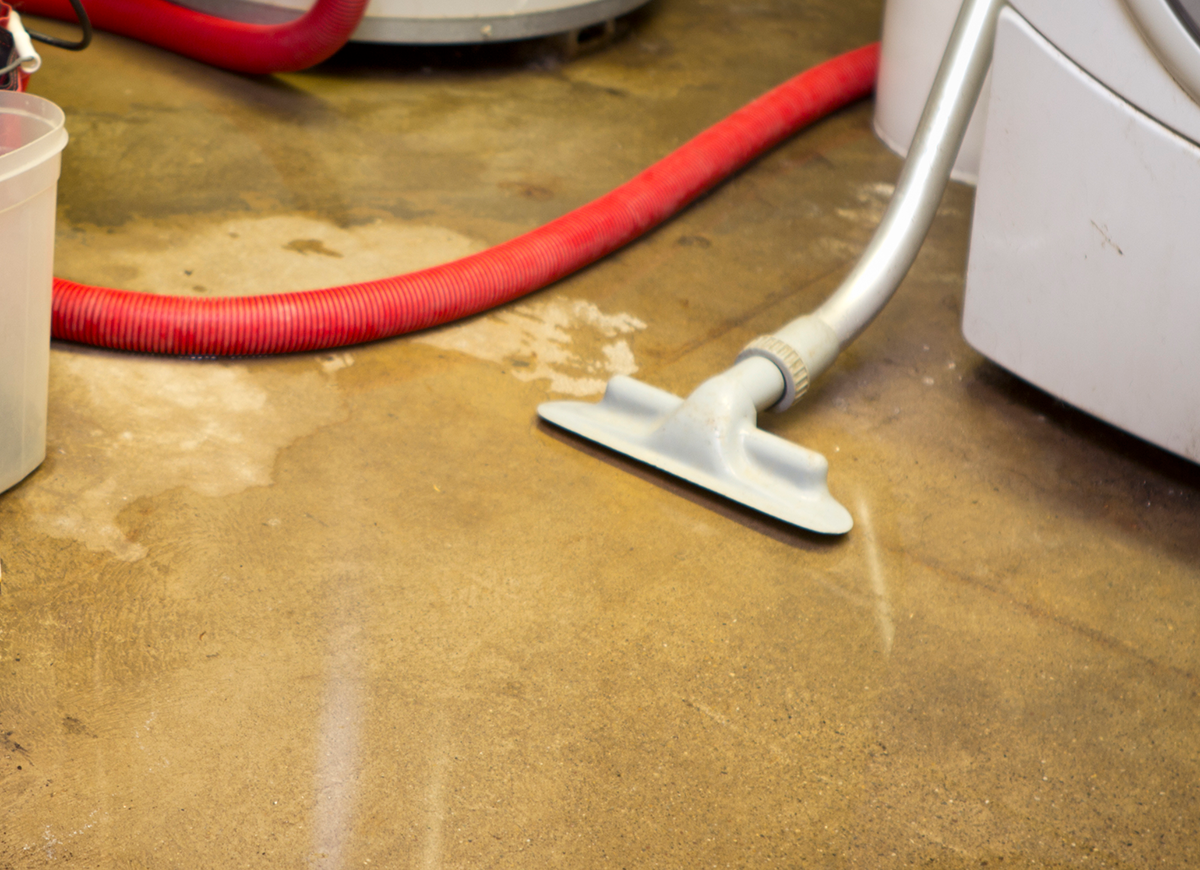 A flooded basement because of water leaking in from walls and windows.