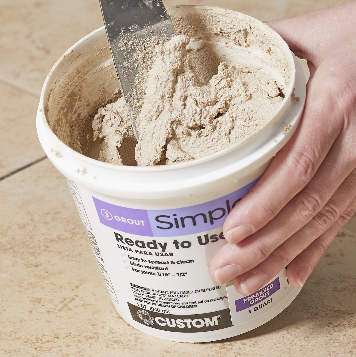 An open container of grout.