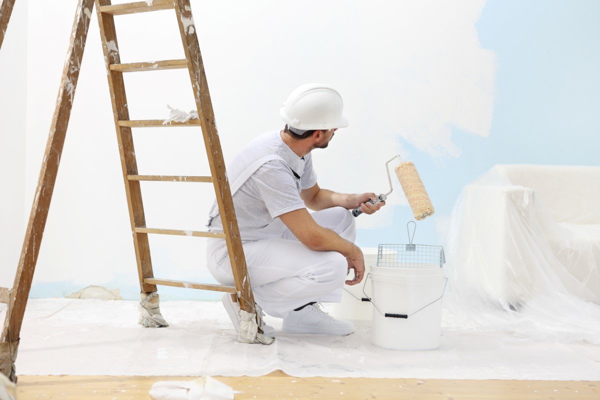Why Do Painters Wear White? Solved!