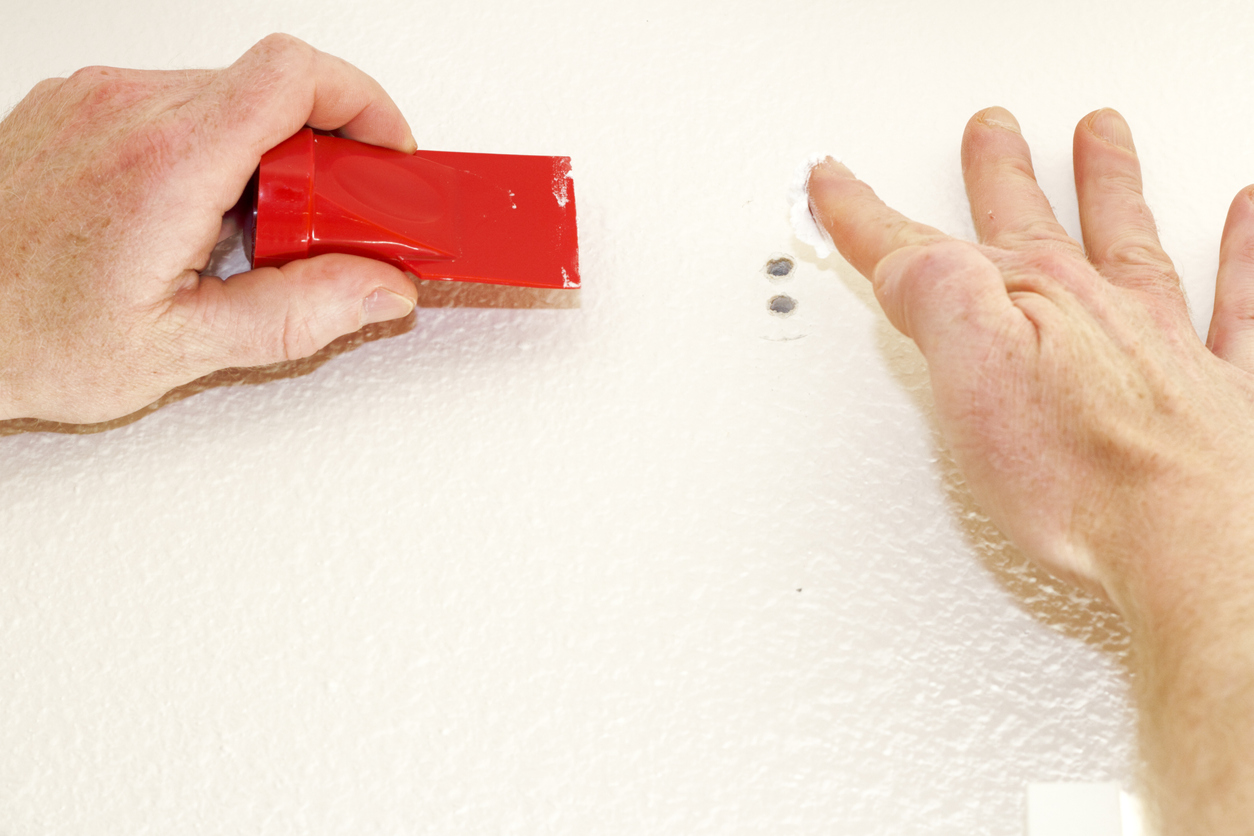 joint compound vs. spackle repairing drywall hole