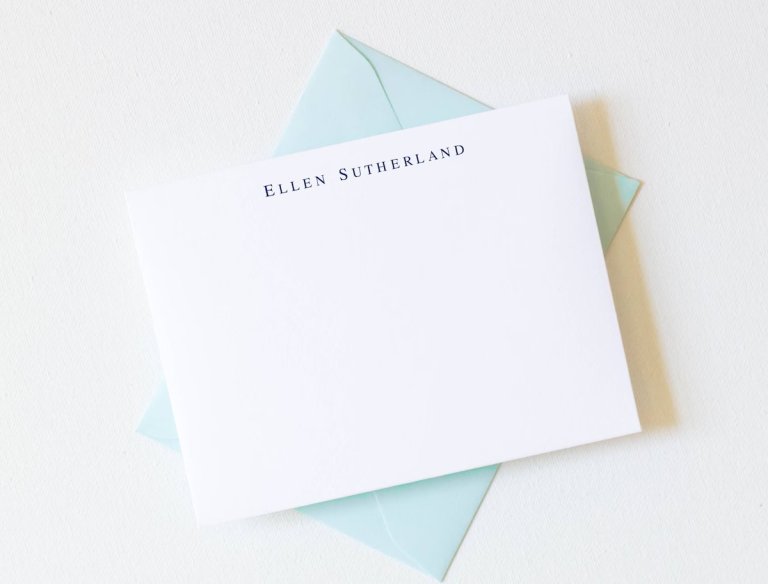Personalized stationery on a blue envelope.