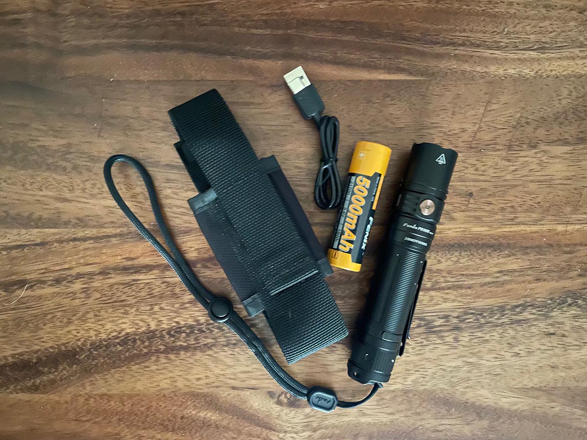 Fenix flashlight with accessories