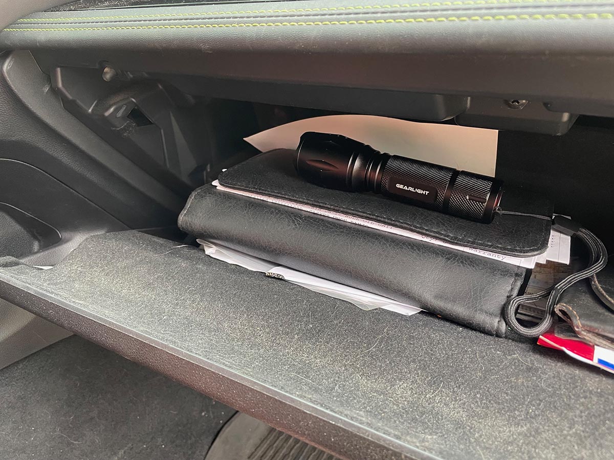 Gearlight flashlight in glove compartment