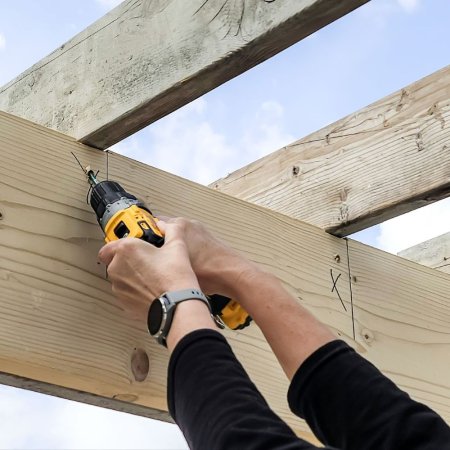  DeWalt DCD701F2 XTREME 12V MAX Drill/Driver Kit drilling into wood