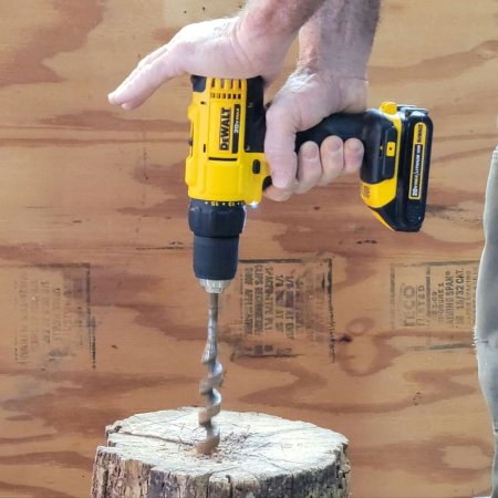  DeWalt DCD771C2 20V MAX Compact Drill/Driver Kit drilling into wood