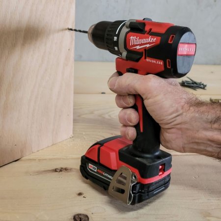  Milwaukee 2801-22CT M18 Compact Drill Driver Kit drilling into wood