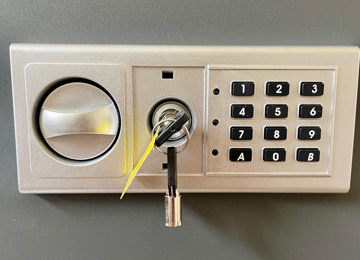 Close up of Paragon wall safe key pad and lock with key inside