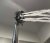 Handheld shower head spraying thick streams of water