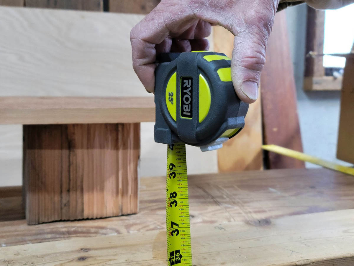 A person using one of the Best Tape Measures Options