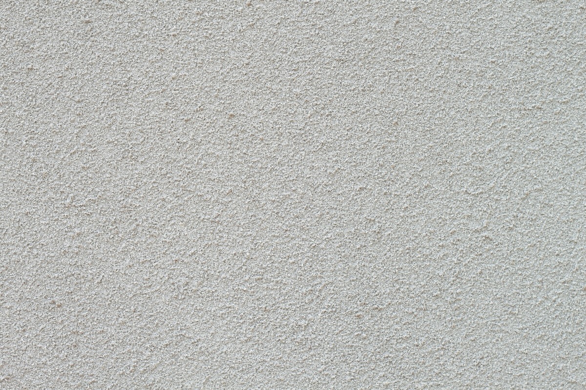 Light sand stone spray on a wall.