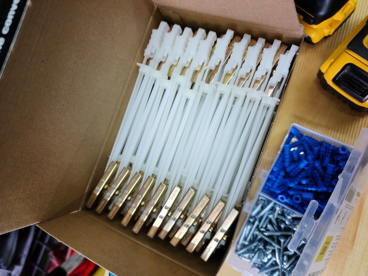 Open boxes of the best toggle bolt and plastic drywall anchors