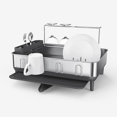 The BSimplehuman Steel Frame Dish Rack loaded with drying dishes on a white background.