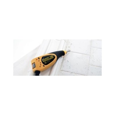 Regrout Tool Electric Grout Remover scraping some white floor tiles